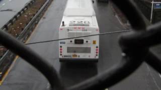Q19 bus under 73rd Street pedestrian overpass