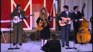 Sheltered In The Arms Of God