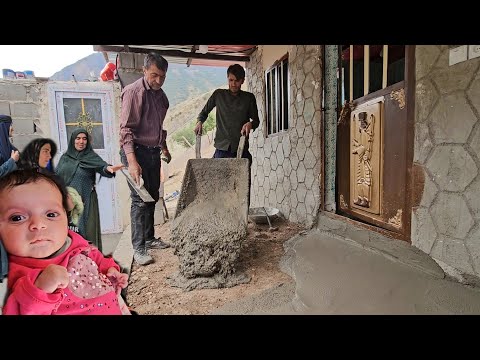 Babak's uncle cements the terrace of the village house and his wife cooks traditional village food