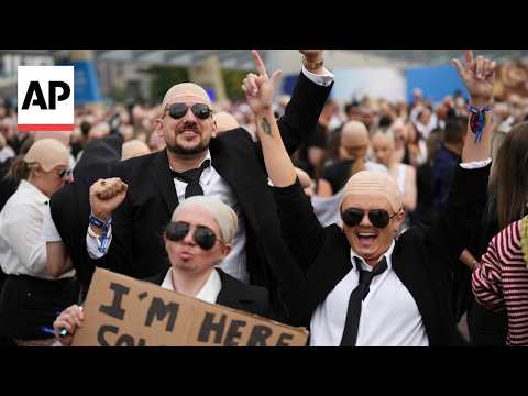 Video Thumbnail: Pitbull fans break bald cap world record in London