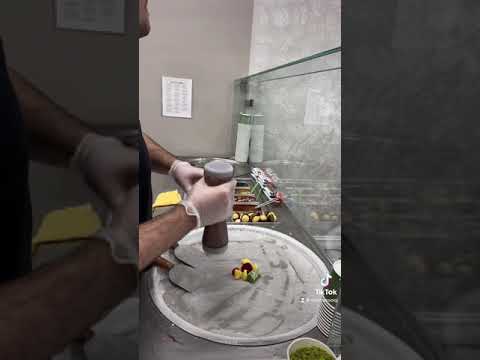 Making rolled ice cream for the regular customer with a twist