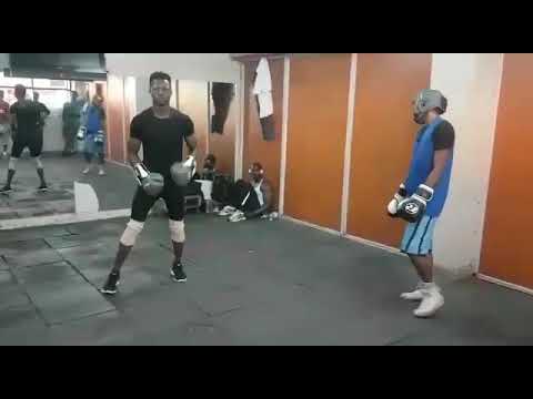 Somalian boxer Kamal Mohammed sparing with heavyweight boxer
