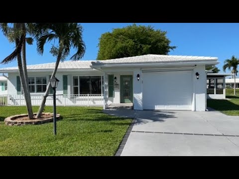 Lakefront 2BR Home in 55+ Leisureville Community property video