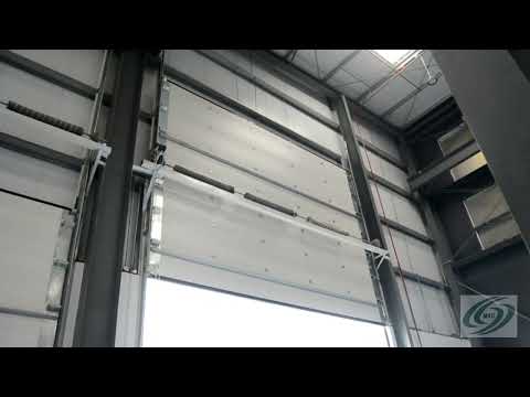 Warehouse vertical sectional door installation