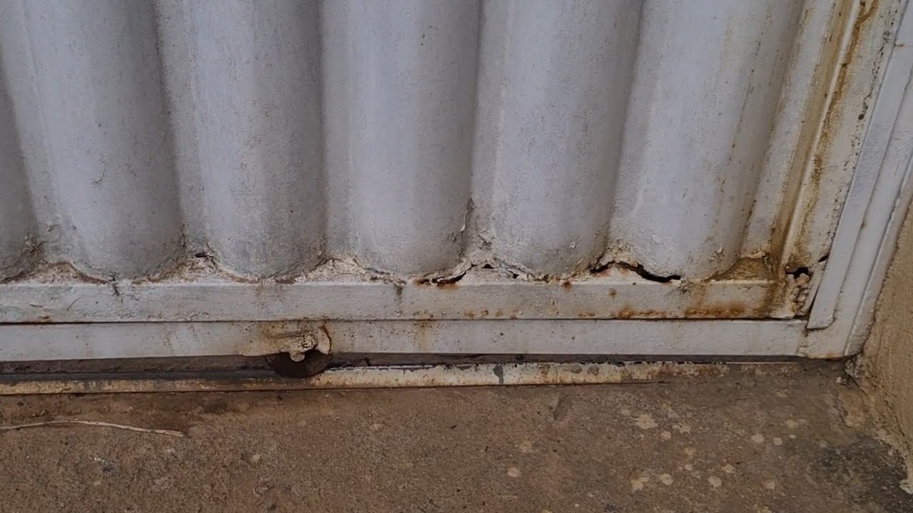 Portão  com ferrugem ? Nóis resolve o problema .