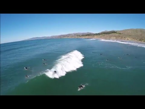 Drone footage of surfers and clean swell at Salmon Creek