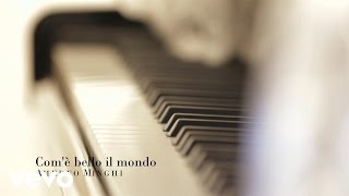 Musik-Video-Miniaturansicht zu Com'è bello il mondo Songtext von Amedeo Minghi