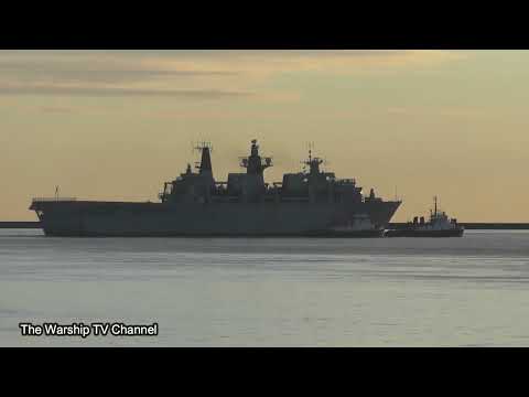 HMS ALBION HEADS OUT TO SEA IN PLYMOUTH SOUND IN A GLORIOUS WINTER SUNSET