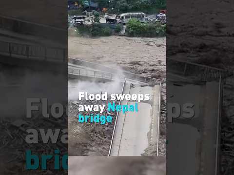 Flash flood destroys bridge as waters surge through Nepal