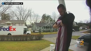 FedEx Driver Stops To Fold Fallen American Flag In Front Yard