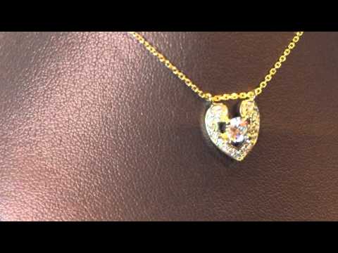 Heart shaped yellow gold pendant with 16 inch chain