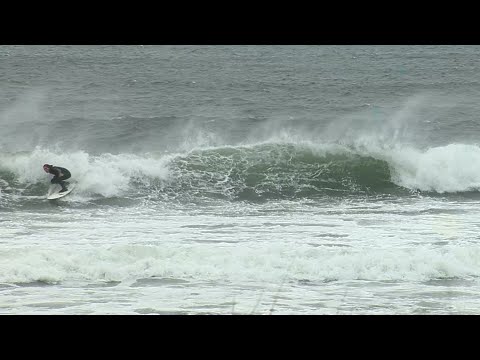Cape Cod residents ride, watch waves as Lee churns toward Canada