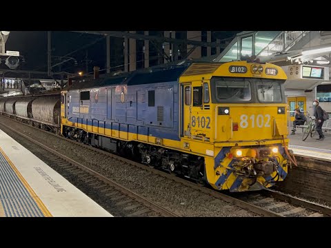 Pacific National’s 8102 leading cement train 4124 through Lidcombe NSW 22-11-2022