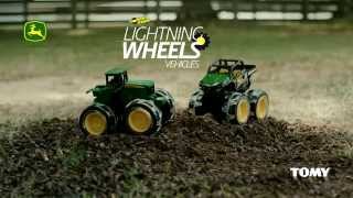 Kombajn John Deere Monster s velkými svítícími pneumatikami Tomy (46434)