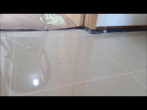 Homogeneous tile polishing with marble gum grout filled