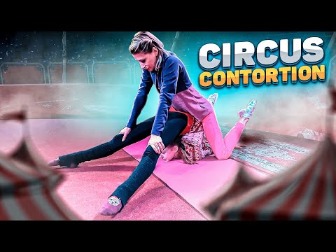 Contortion Training in the Circus. Flexibility Exercise. Two Contortionist.