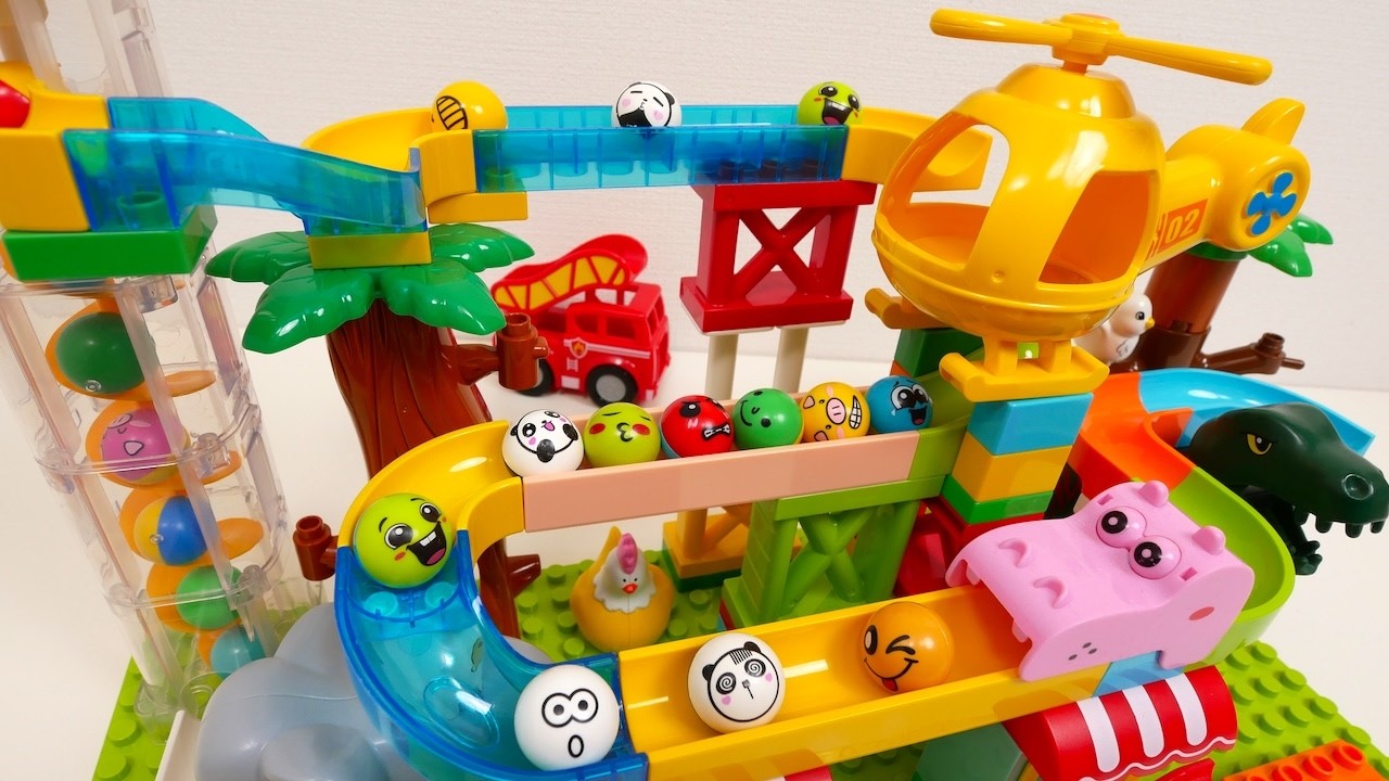 Satisfying Building Blocks Marble Run A course featuring helicopters, fire engines, and elephants