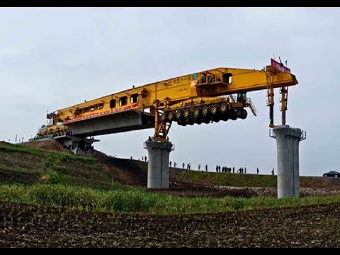 Assista a esta mega-máquina erguer uma ponte na China SLJ900 32