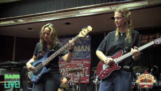 The Travis Larson Band performs at the Music Man booth at Bass Player Live