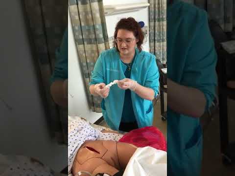 Sterile Wet-to -Dry Wound Dressing Change with Irrigation