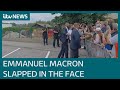 Two arrested after French President Emmanuel Macron slapped in the face | ITV News