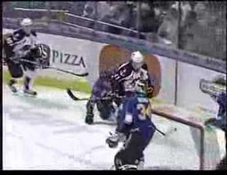 Antti Pihlstrom pastes a Peoria player to the boards on 3/14