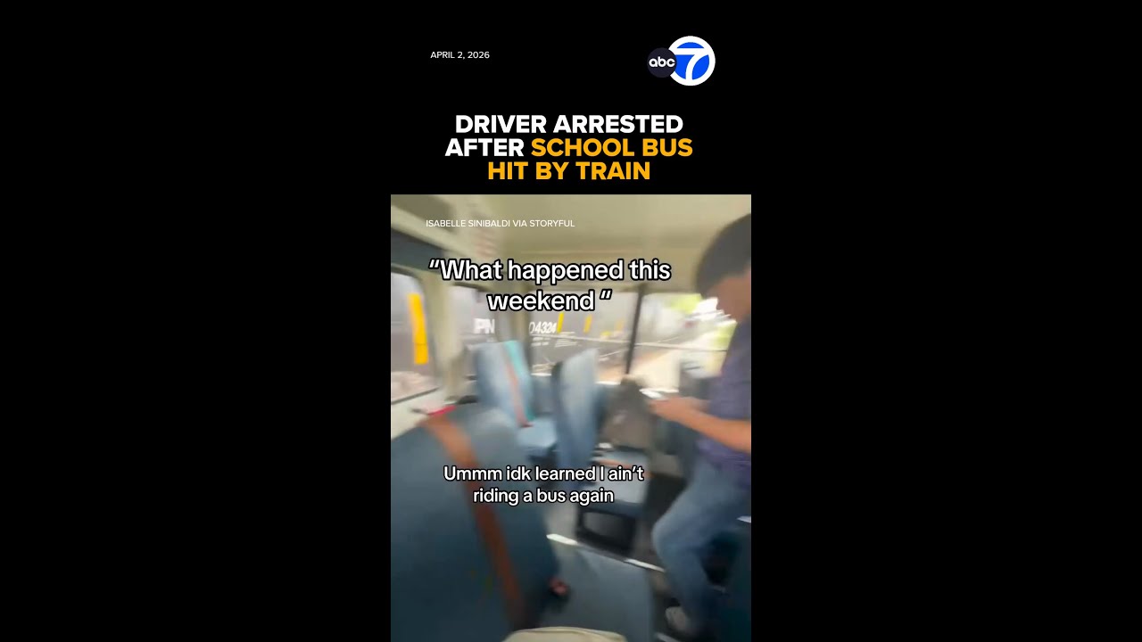 Driver arrested after school bus full of children hit by train