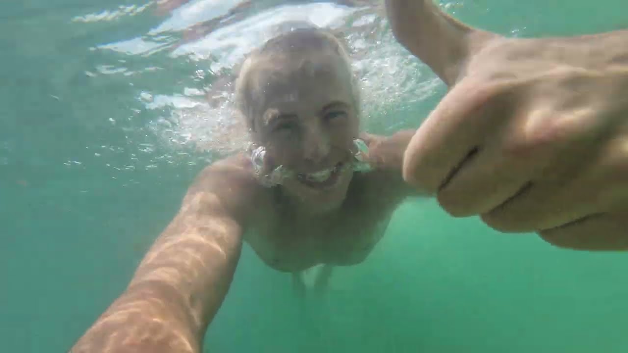 A traveler embarks on a captivating journey to the serene Taling Ngam Beach.