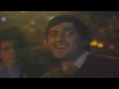 Saturday Night Fever 1977 trailer still — Travolta’s Tony Manero under Odyssey’s mirror ball