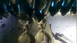 automatic dropping  machine for soft pvc key chain