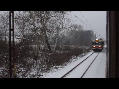 PASSING ELECTRIC UNIT EN57-673 AT MYSLOWITZ IN THE SNOW POLAND 06/01/10