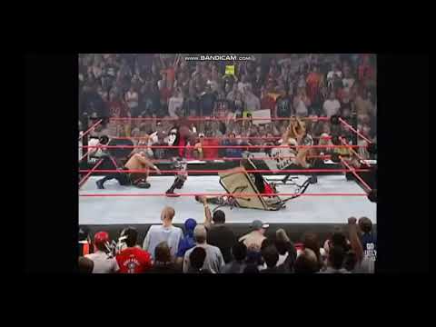 Bubba Ray Dudley powerbombs Torri Wilson through table