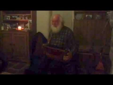 Mike Absalom sings a cowboy song and plays squeezebox at Carrowcrory Cottage