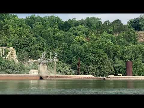 Barge Loader dumping TONS of gravel.