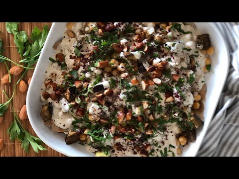 Fatteh: chickpeas, eggplant and pita bread with tahini mix فتة بالحمص والباذنجان
