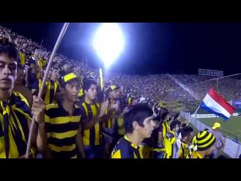 "La  Hinchada Aborigen Guarani vs Racing I." Barra: La Raza Aurinegra &bull; Club: Guaraní de Asunción