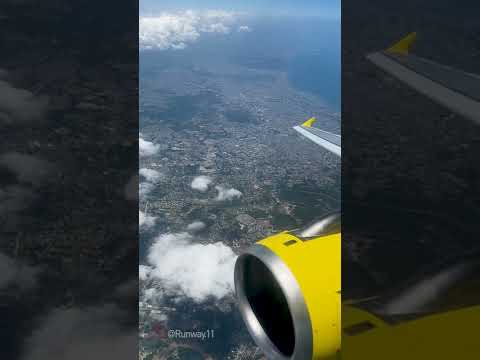 Spirit A319 flying over Dominican Republic after taking off from Las Americas International Airport