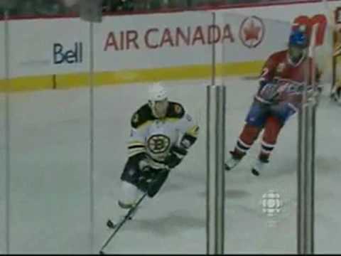 Saku Koivu hits Denis Wideman