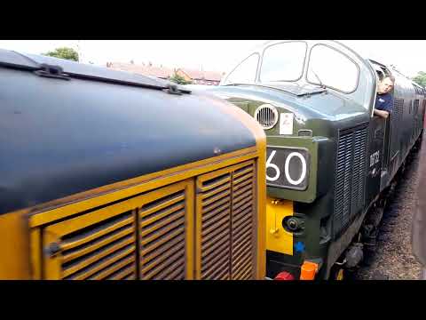 here's 37401'Mary Queen Of Scots' & D6732 seen passing through on the north norfolk railway--11/6/22