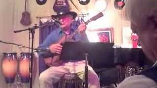 "Bury Me Not on the Lone Prairie" performed by Cal Watkins