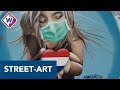 Street-art kunstenaars beschilderen bouwschutting bij voormalig postkantoor Den Haag - OMROEP WEST