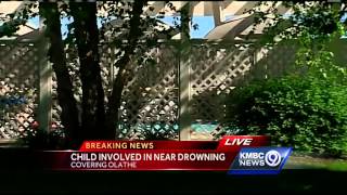 Woman helps save boy after Olathe near-drowning