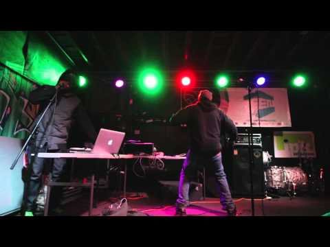 Stik Figa at Middle of the Map with Lowercase Kansas and KJHK