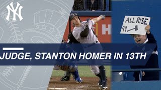 Aaron Judge and Giancarlo Stanton crush homers in the 13th to the delight of a fan