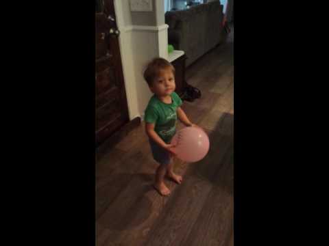 Roman playing with a balloon
