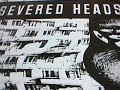 SEVERED HEADS-'STRETCHER' (b side) 1.BIG BLUE IS BACK. 2. HEAT SEEKING SUSAN. 3.NEW EXPLOSIONS