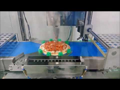Pizza cutting machine