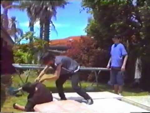 xCw Carnival Of Carnage 2003 - I Quit/Strap Match - Aston Crude (Tazer) Vs Homicide