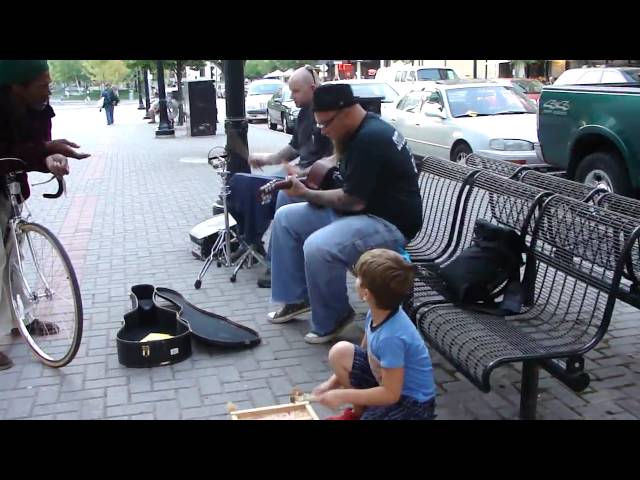 Husky Burnette busking on Monroe Center in Grand Rapids, MI Part 7