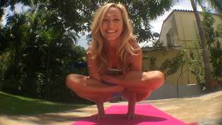 Yoga in Miami: Garbha Pindasana Kukkutasana